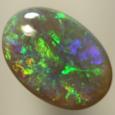 SOLID SEMI BLACK OPAL Bright green moves over hues of purple